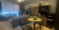 A nicely interior 1-bedroom unit for sale at Eastwood Parkview Tower 2, conveniently located above Eastwood Mall in Libis, Quezon City.