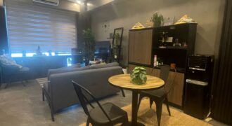 A nicely interior 1-bedroom unit for sale at Eastwood Parkview Tower 2, conveniently located above Eastwood Mall in Libis, Quezon City.