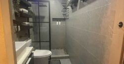 A nicely interior 1-bedroom unit for sale at Eastwood Parkview Tower 2, conveniently located above Eastwood Mall in Libis, Quezon City.