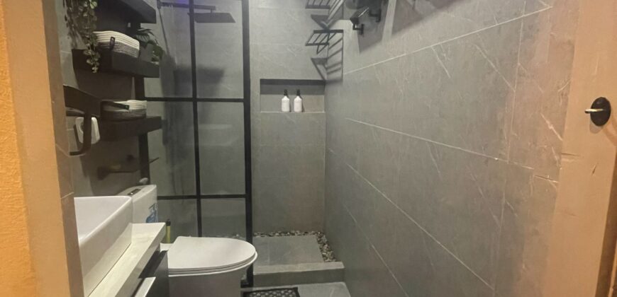 A nicely interior 1-bedroom unit for sale at Eastwood Parkview Tower 2, conveniently located above Eastwood Mall in Libis, Quezon City.