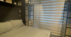 A nicely interior 1-bedroom unit for sale at Eastwood Parkview Tower 2, conveniently located above Eastwood Mall in Libis, Quezon City.