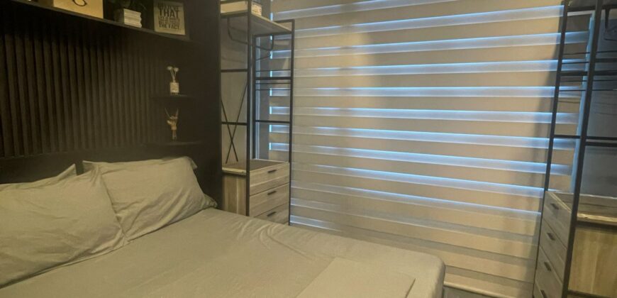 A nicely interior 1-bedroom unit for sale at Eastwood Parkview Tower 2, conveniently located above Eastwood Mall in Libis, Quezon City.
